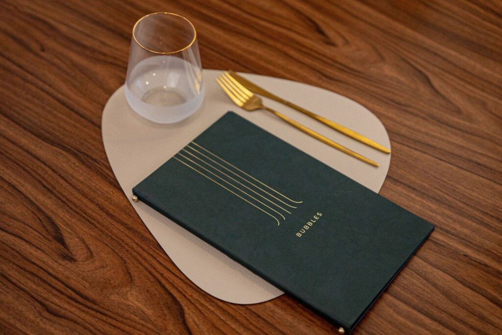 hard cover menu wine bubbles olivar