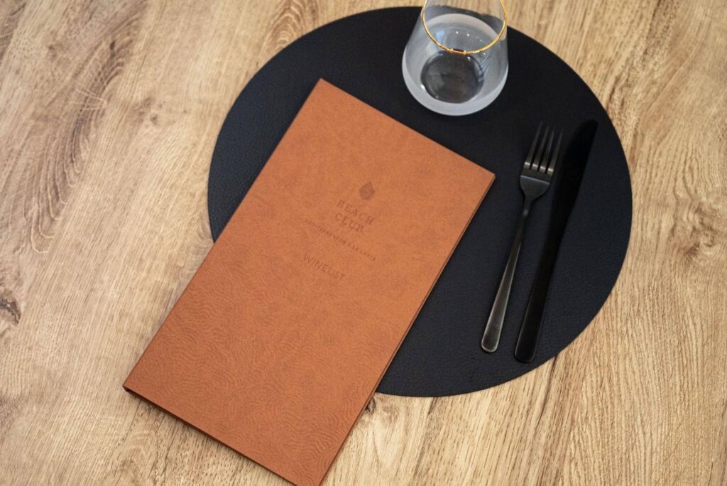 hard cover menu wine beach club sani